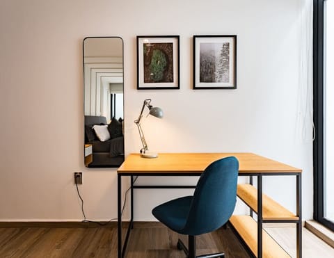 Bright and stylish workspace with a minimalist desk and ergonomic chair, perfect for remote work.