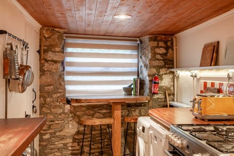 Please note, the kitchen has a low ceiling.