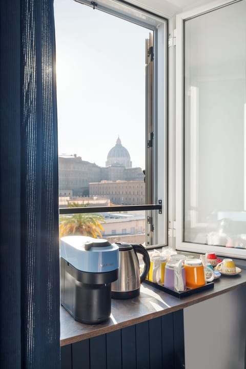 Quadruple Room, Private Bathroom, City View | In-room safe, blackout drapes, soundproofing, iron/ironing board