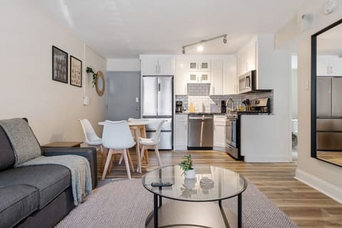 As you take a seat in the living room, the comfortable furniture and tasteful design make it easy to unwind.