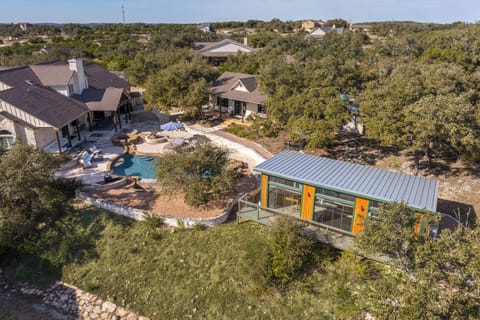 This spacious property offers a main home, casita, and flex building.