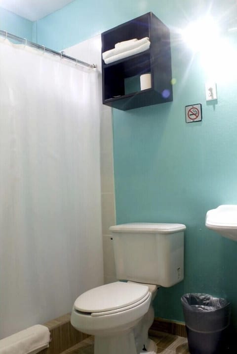 Standard Double Room, Patio | Bathroom | Shower, hair dryer, towels, soap