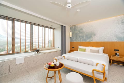 Deluxe Room, 1 King Bed (Bathtub) | In-room safe, iron/ironing board, free cribs/infant beds, bed sheets