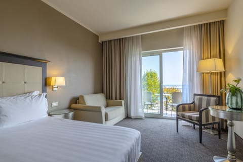 Junior Suite, Balcony, Lake View | Premium bedding, down comforters, minibar, in-room safe