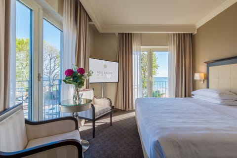 Suite, Balcony, Lake View | Premium bedding, down comforters, minibar, in-room safe