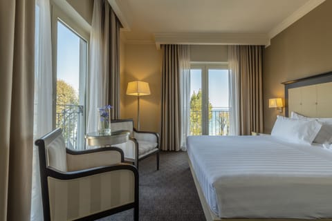 Suite, Balcony, Lake View | Premium bedding, down comforters, minibar, in-room safe