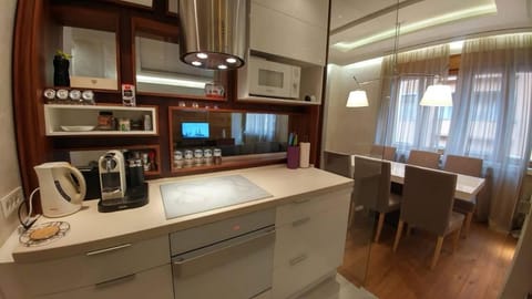 Luxury Apartment, Garden View | Private kitchen | Full-size fridge, microwave, stovetop, dishwasher