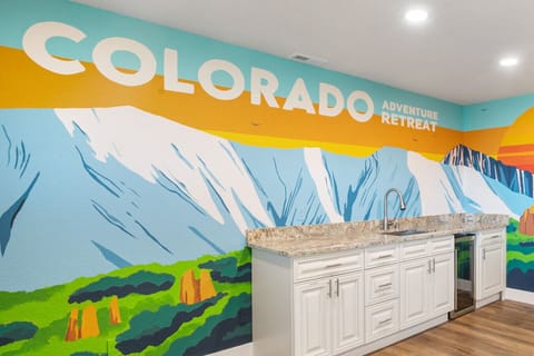 Bar area in the lower level near the entrance from the driveway