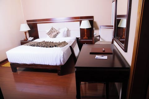 Standard Double Room, Balcony, City View | In-room safe, individually decorated, individually furnished, desk