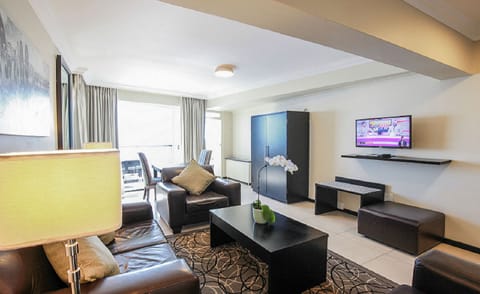 Deluxe Executive Family Suite - Sea Facing | Living area | 50-inch flat-screen TV with satellite channels, TV, Netflix