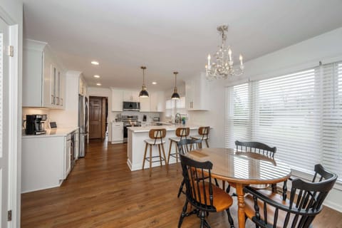 The sophisticated kitchen offers ample space & every home comfort