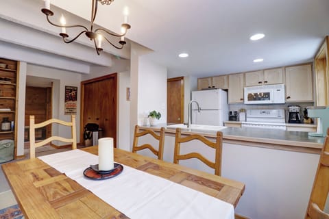 Dining room table looking towards the kitchen.