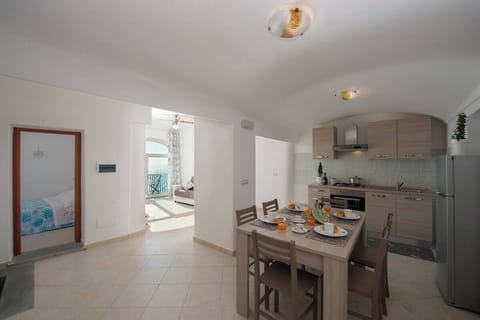 Panoramic Apartment | Private kitchen | Full-size fridge, stovetop, cookware/dishes/utensils, cleaning supplies