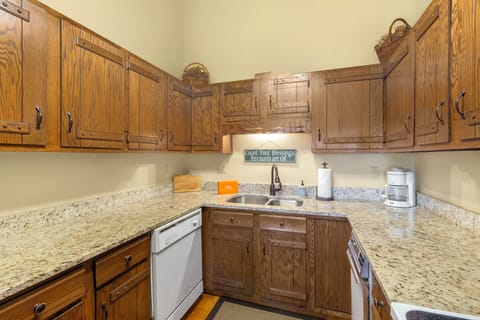 Kitchen - Our kitchen offers granite countertops and a drip coffee pot.
