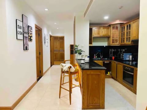 Deluxe Apartment, 3 Bedrooms, City View | Private kitchen | Fridge, stovetop