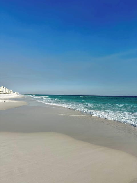 Endless stretches of pristine white sand and emerald Gulf waters await at Holiday Isle Beach! Whether you're soaking up the sun, taking a peaceful stroll, or enjoying the waves, this stunning shoreline offers the perfect beach escape.