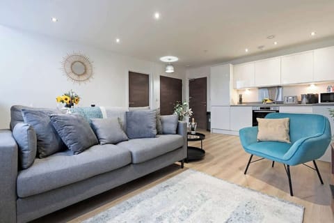 The open-plan living room, dining area and kitchen benefit from a comfortable sofa and 40-inch SMART TV.