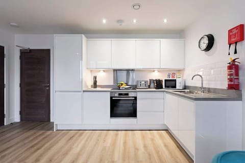 The fully equipped kitchen has everything you need for a short or long term stay whilst away in Manchester.