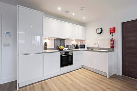 The fully equipped kitchen has everything you need for a short or long term stay whilst away in Manchester.