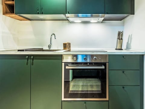 Kitchen, Kitchen Appliance, Flooring, Major Appliance, Cabinetry, Countertop, Interior Design, Kitchen Stove, Floor, Drawer