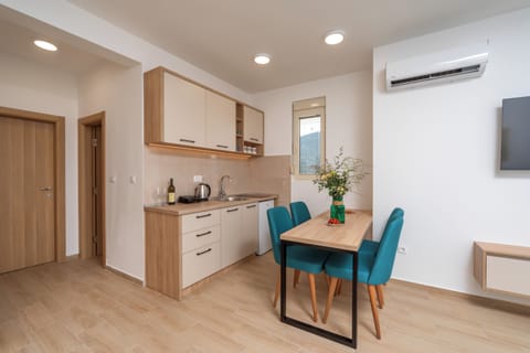 Apartment, Sea View | Private kitchen | Mini-fridge