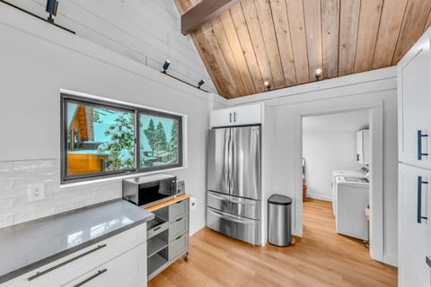 Kitchen: Keurig, kettle, toaster, cooking utensils, tableware