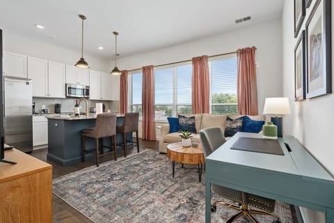 Spacious open concept living area with lots of natural light 