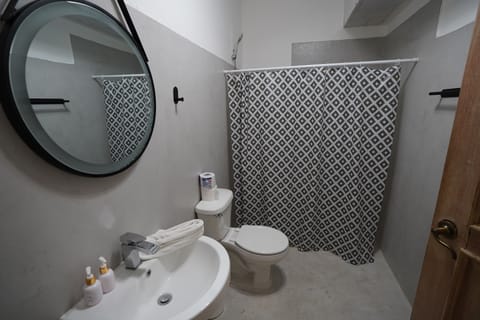 Quadruple Room, Balcony, Pool View | Bathroom | Shower, free toiletries, towels, soap