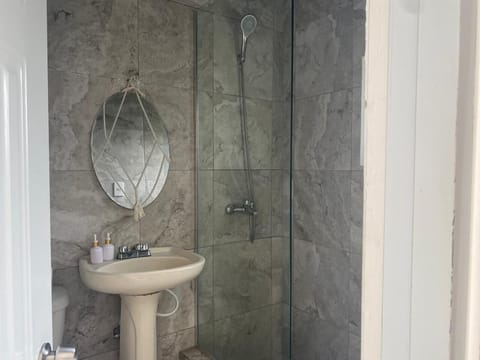 Basic Bungalow, Garden View | Bathroom | Shower, free toiletries, towels, soap