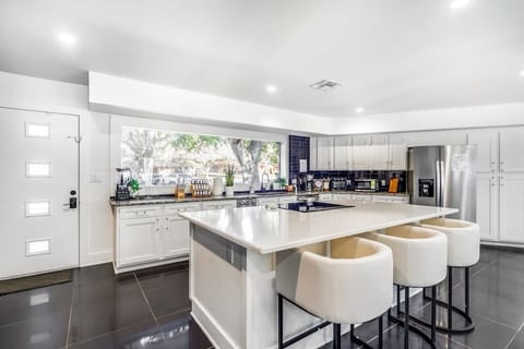 Open concept kitchen to cook up all your meals! We provide all basic cooking needs like oil and spices. Coffee and tea included as well!