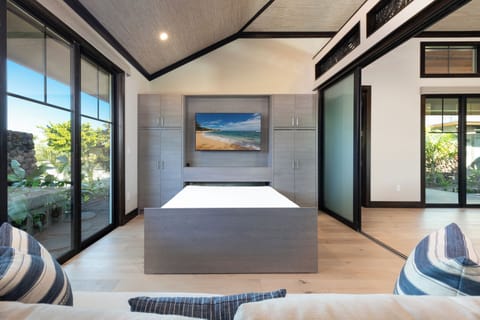 The den is perfect for watching TV or used as an alternative sleeping area.