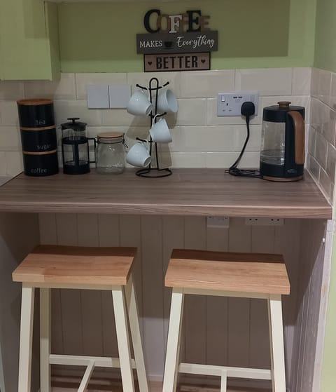 Relax, unwind and charge your phone while having a coffee at the breakfast bar.