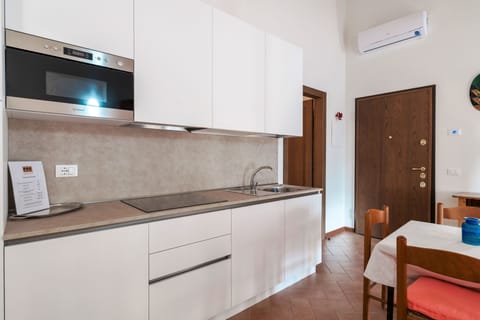 Standard Apartment | Private kitchen | Full-size fridge, espresso maker, electric kettle, paper towels