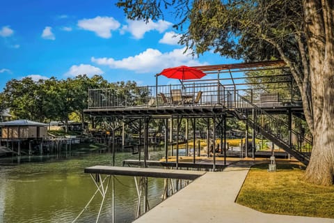 Elevated deck with stunning river views and outdoor seating.