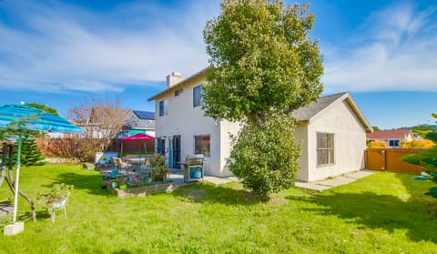 Your furry friends will love playing around on the grass in this fenced yard