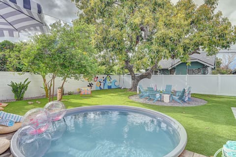 Trendy Tank Pool, Fire Pit, expansive lawn with yard games.