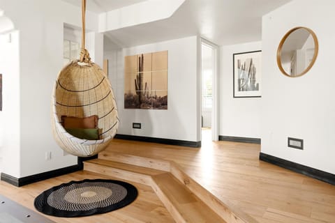 Our hanging egg chair offers the perfect spot to unwind and relax while adding a touch of elegance to the space.