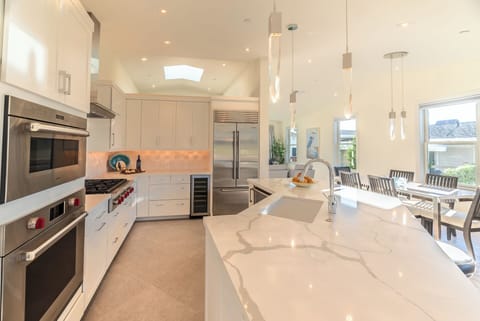 Wolf appliances & the wine fridge make dinner easy