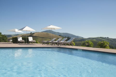 Seasonal outdoor pool, pool umbrellas, sun loungers