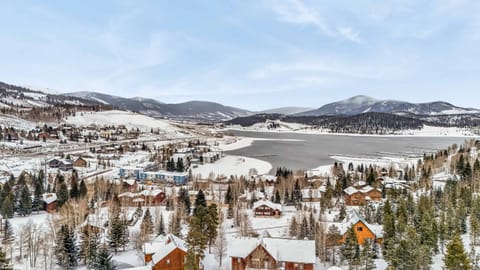 Aerial view: This home sits close to Lake Dillon, featuring beautiful mountain views.