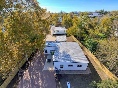 Outdoor Oasis: Enjoy serene views amidst vibrant trees from your private retreat!