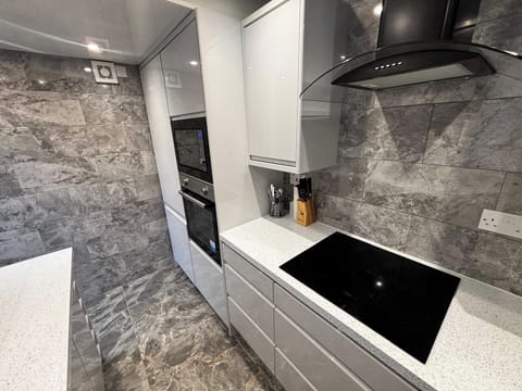 Modern kitchen with cooking utensils