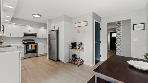 Dining area off of kitchen. Coffee cart with kurig and drip coffee available. 