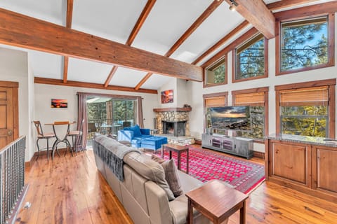 Living room: Wood-burning fireplace (wood not provided), 55" Smart TV, wet bar, radiant heating, no A/C
