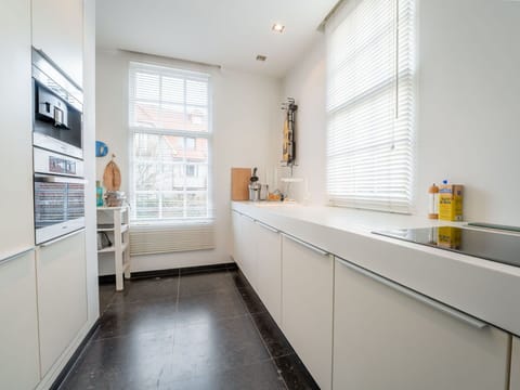 Flooring, Interior Design, Countertop, Kitchen, Floor, Cabinetry, Ceiling, Kitchen Appliance, Plumbing Fixture, Home