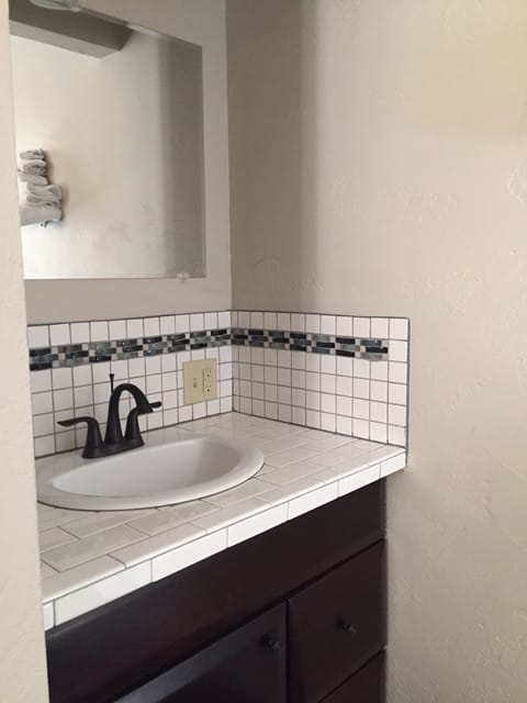 Standard Double Room, 2 Queen Beds | Bathroom sink