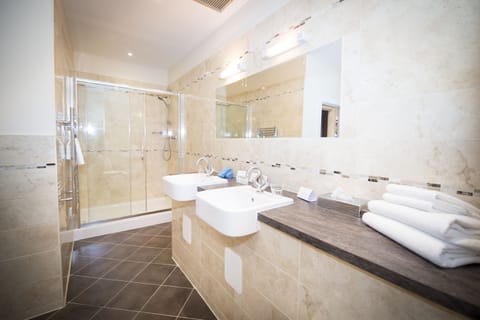 Ness Suite | Bathroom | Free toiletries, hair dryer, towels