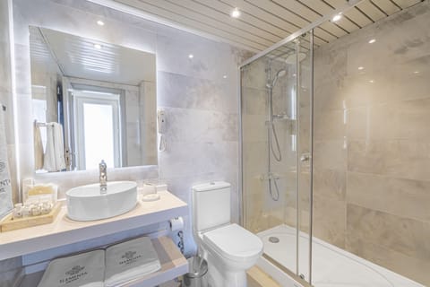 Exclusive Suite, 1 Bedroom, Non Smoking, Sea View | Bathroom | Shower, hair dryer, slippers, towels