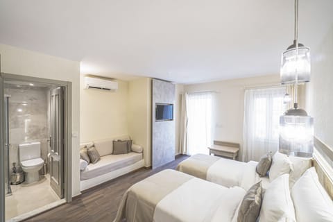 Classic Double or Twin Room, 1 Bedroom, Sea View | Minibar, in-room safe, desk, laptop workspace