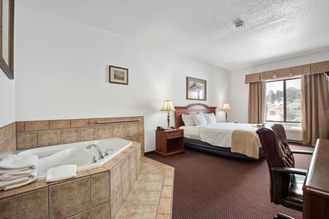 Presidential Room, 1 King Bed, Non Smoking, Jetted Tub | Private spa tub